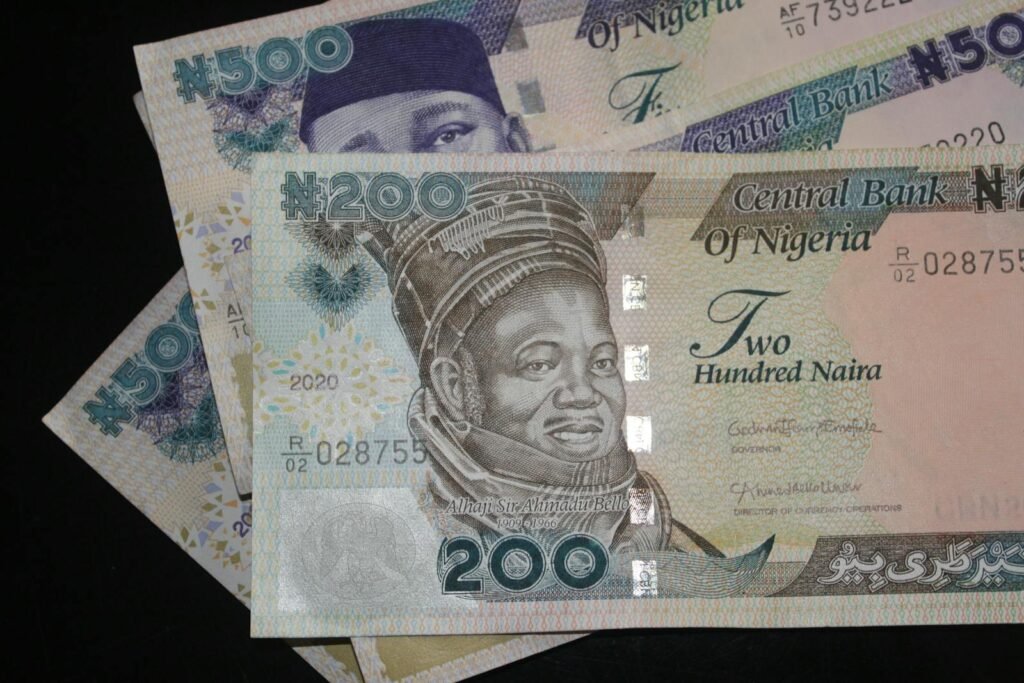 Detailed close-up view of Nigerian naira currency, highlighting N200 and N500 notes.